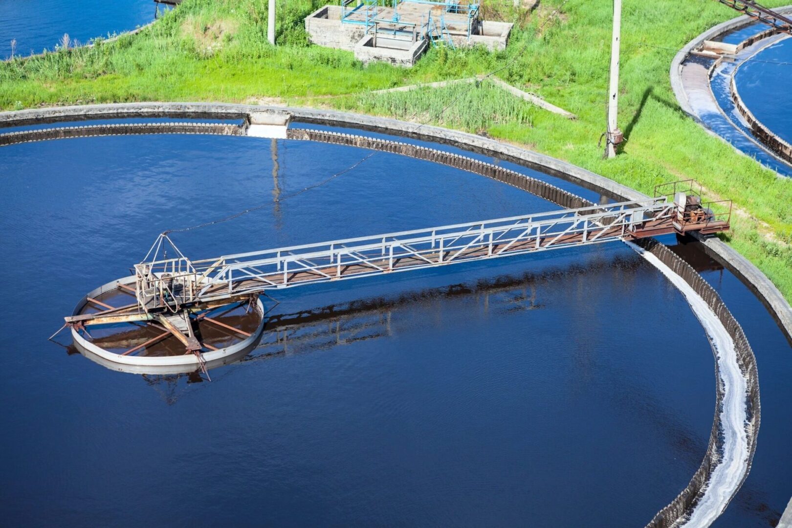 A large water plant with a boat in the middle of it.